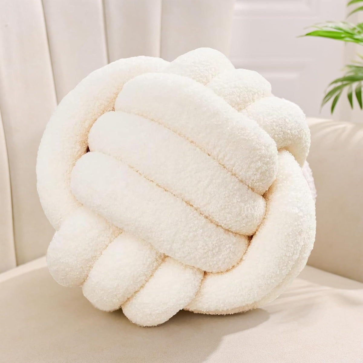 Coussin décoratif noué blanc cassé 22 cm